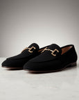 Silvorne black suede loafers with gold horsebit detail and almond toe. Suitable for casual or semi-formal wear.