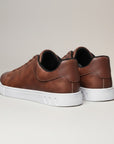Silvorne men's brown leather-look low top sneakers with white soles and black trim.