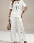 Silvorne conjunto blanco de lino y algodón para mujer, top corto de manga y pantalones anchos con botones decorativos.
