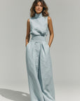 Silvorne light blue linen blend sleeveless high neck tank top and wide leg pants set with side pockets.