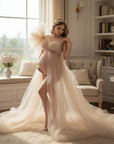 Silvorne beige sheer tulle maternity gown with single shoulder and flowing skirt, perfect for photography.