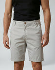 Silvorne men's light grey cotton chino shorts with a relaxed fit and elastic waist detail. Casual summer style.