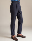 Silvorne Men's dark grey high-waist straight-leg trousers with double button closure and cuffed hem.