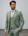 Silvorne men's sage green three-piece suit with a single-breasted one-button jacket, waistcoat, and tailored trousers. Features peak lapels and a patterned pocket square.