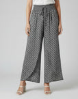 Silvorne women's black and white patterned wide-leg trousers with elastic waistband and drawstring.