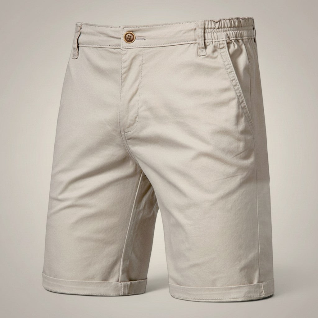 Silvorne men's beige cotton chino shorts with relaxed fit, elastic waist detail, and cuffed hems.