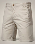 Silvorne men's beige cotton chino shorts with relaxed fit, elastic waist detail, and cuffed hems.