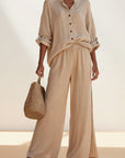Silvorne women's relaxed beige linen-blend button-front blouse and wide-leg trousers set with rolled sleeves.