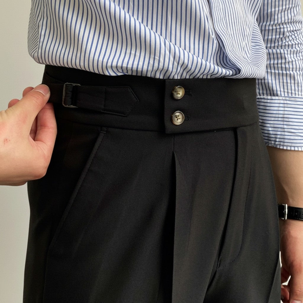 Silvorne men's black high-waist straight-leg draped trousers with double button closure and side pocket detail.