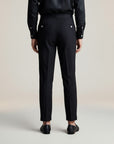 Silvorne Men's black woven high-waist tailored trousers with a classic waistband and clean lines.