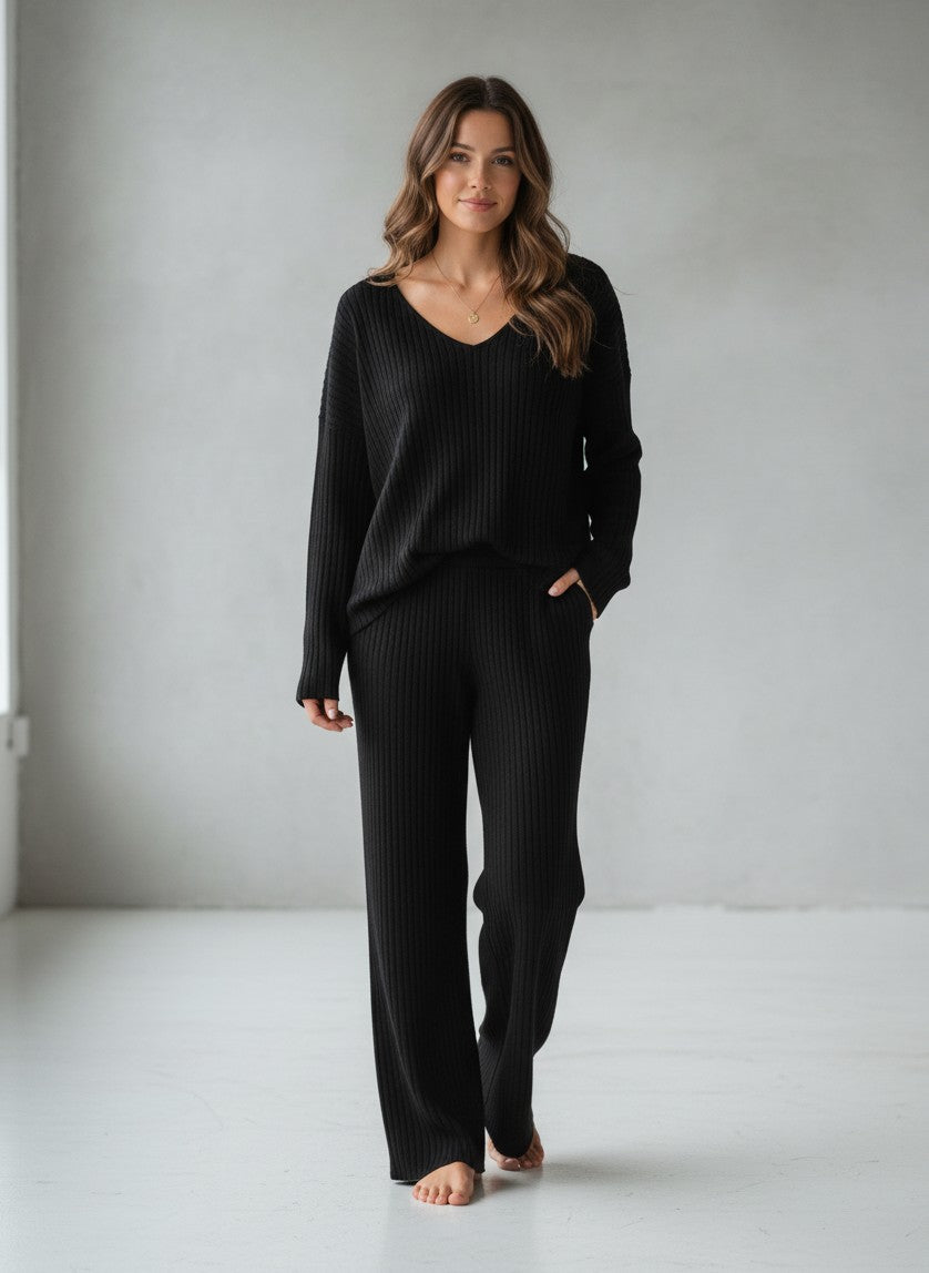 Silvorne black ribbed knit V-neck loungewear set with wide leg pants.