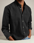 Silvorne men's black long-sleeve slim-fit button-up shirt with turn-down collar and chest pocket.