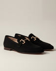 Silvorne black suede loafers with gold horsebit detail and almond toe.