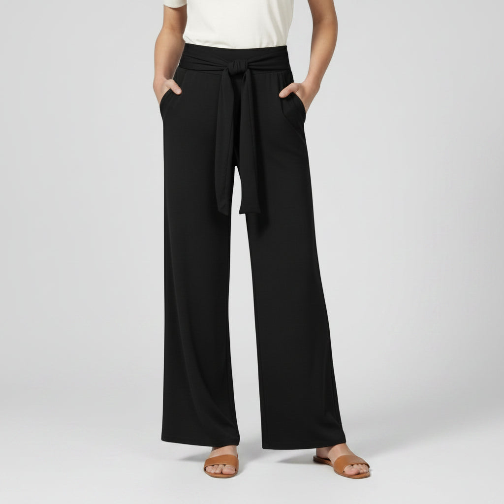 Silvorne women's black wide-leg trousers with a tied waistband and pockets. Casual, relaxed fit.