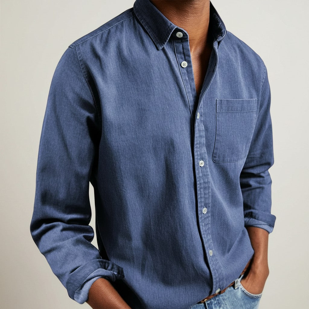 Silvorne men's slim-fit blue denim long-sleeve button-up shirt with turn-down collar and chest pocket.