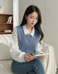 Silvorne blusa de poliéster azul y blanco de manga larga con cuello polo y diseño de dos piezas falsas.