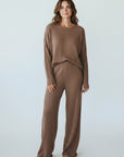 Silvorne women's brown ribbed knit loungewear set with V-neck top and wide leg pants.
