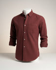Silvorne men's slim-fit solid burgundy long-sleeve button-up shirt with turn-down collar and chest pocket.