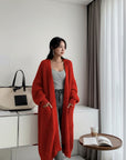 Silvorne rojo punto largo cárdigan de manga larga con bolsillos, ideal para otoño e invierno.