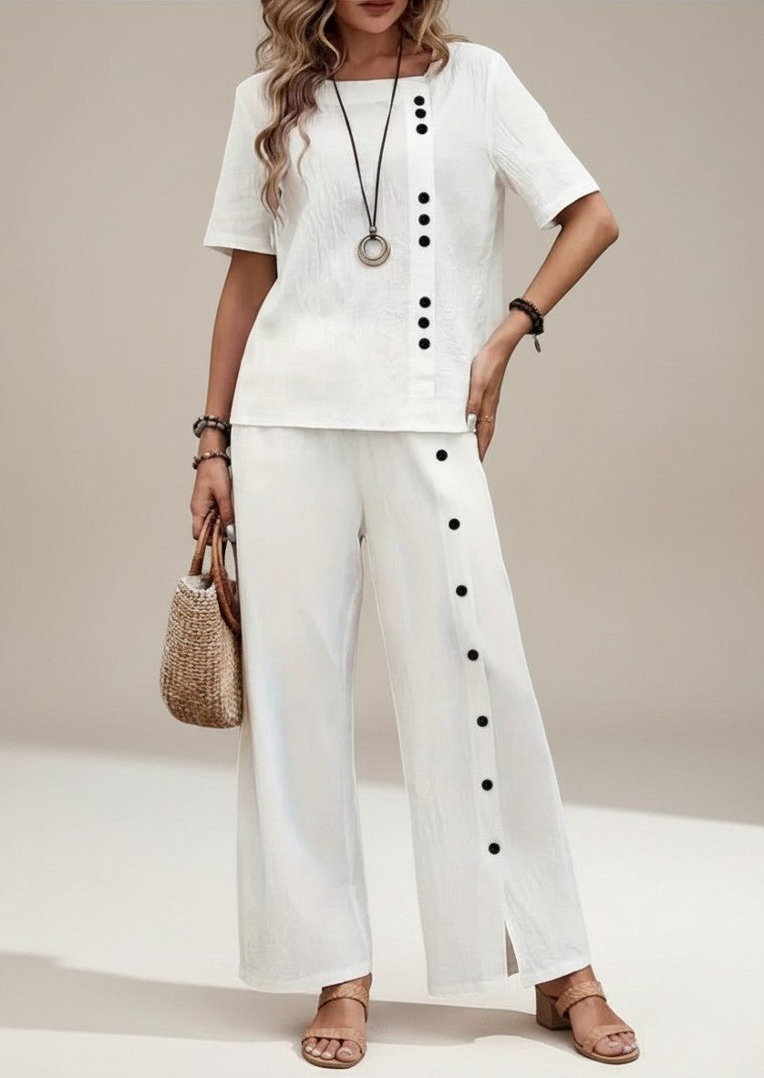 Silvorne conjunto blanco de lino y algodón para mujer, top corto de manga y pantalones anchos con botones decorativos.