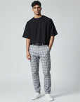 Silvorne Men's slim-fit ankle-length pants in grey plaid woven fabric with a black belt.