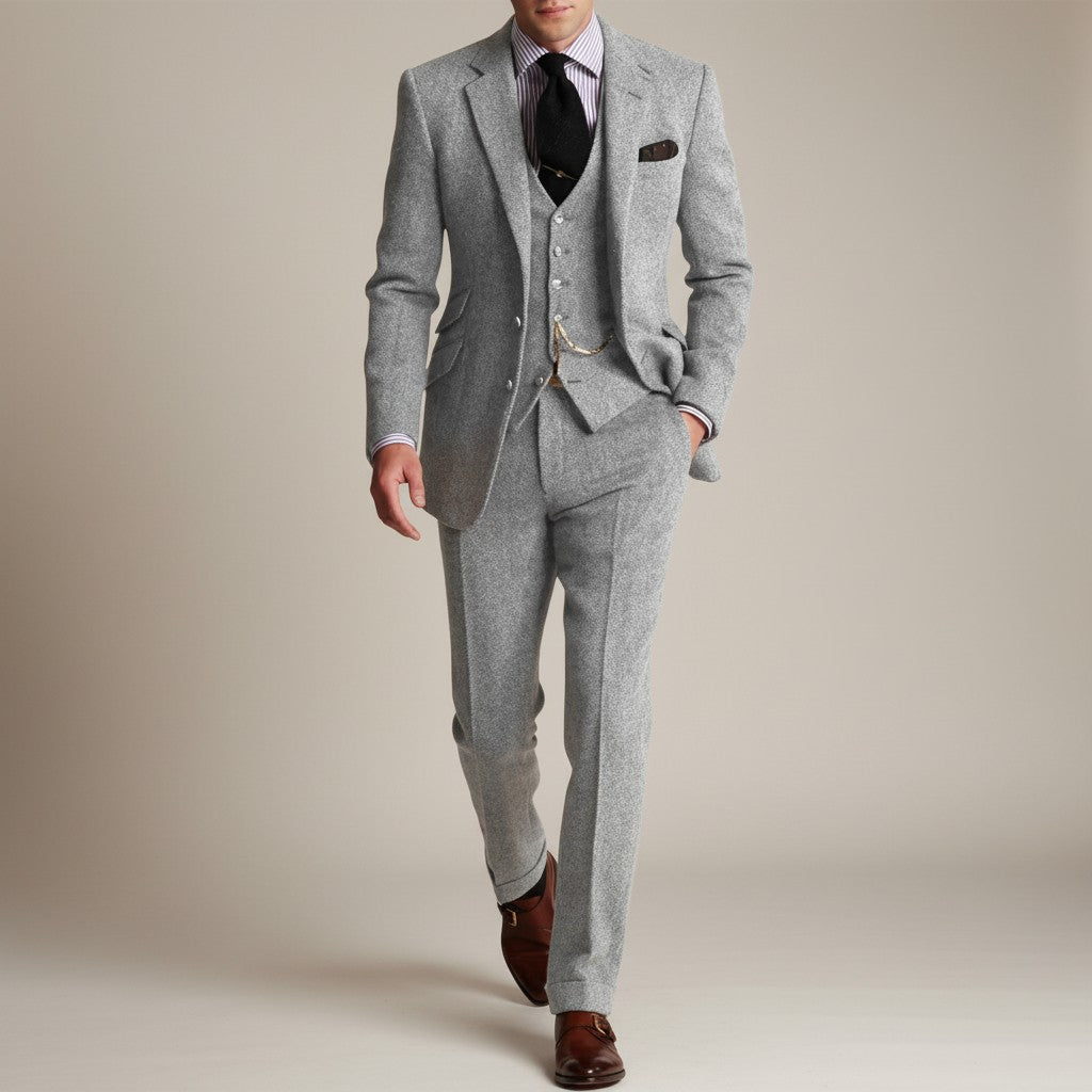 Silvorne Men's classic light grey three-piece tweed suit with a structured jacket, waistcoat, and trousers. Features a textured finish and tailored fit.