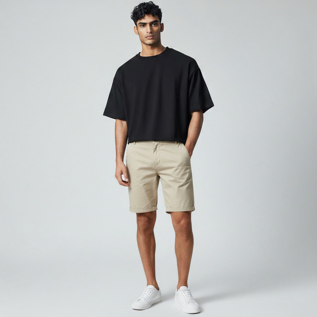 Silvorne men's relaxed fit chino shorts in beige cotton with elastic waist detail and cuffed hems.