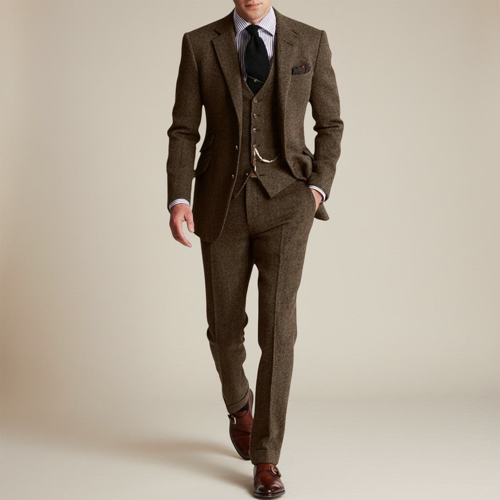 Silvorne Men's classic three-piece tweed suit in brown. Features a structured jacket, waistcoat, and tailored trousers with a timeless texture.