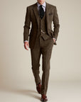 Silvorne Men's classic three-piece tweed suit in brown. Features a structured jacket, waistcoat, and tailored trousers with a timeless texture.