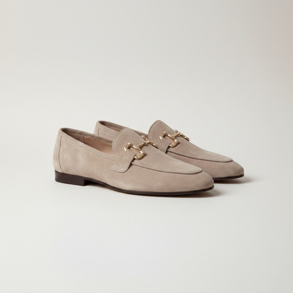 Silvorne men's beige suede loafers with gold horsebit detail and almond toe.