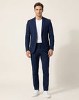 Silvorne men's navy blue tailored two-piece suit set with white t-shirt and sneakers.