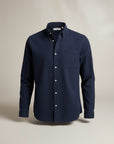Silvorne men's navy blue slim-fit long-sleeve button-up shirt with turn-down collar and chest pocket.