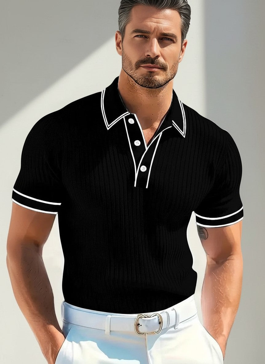 Silvorne polo de manga corta negro con ribetes blancos, tejido acanalado, cuello y puños a rayas. Ideal para verano.