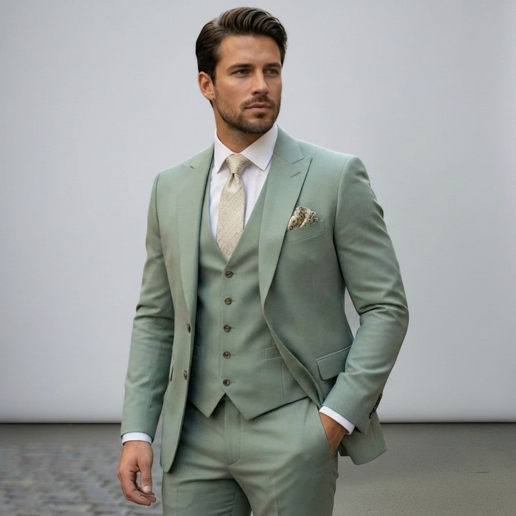 Silvorne men's sage green three-piece suit with a single-breasted one-button jacket, waistcoat, and tailored trousers. Features peak lapels and a patterned pocket square.