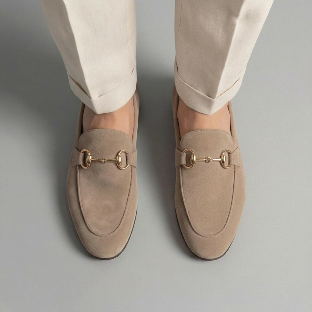 Silvorne men's taupe suede loafers with gold horsebit detail and almond toe.