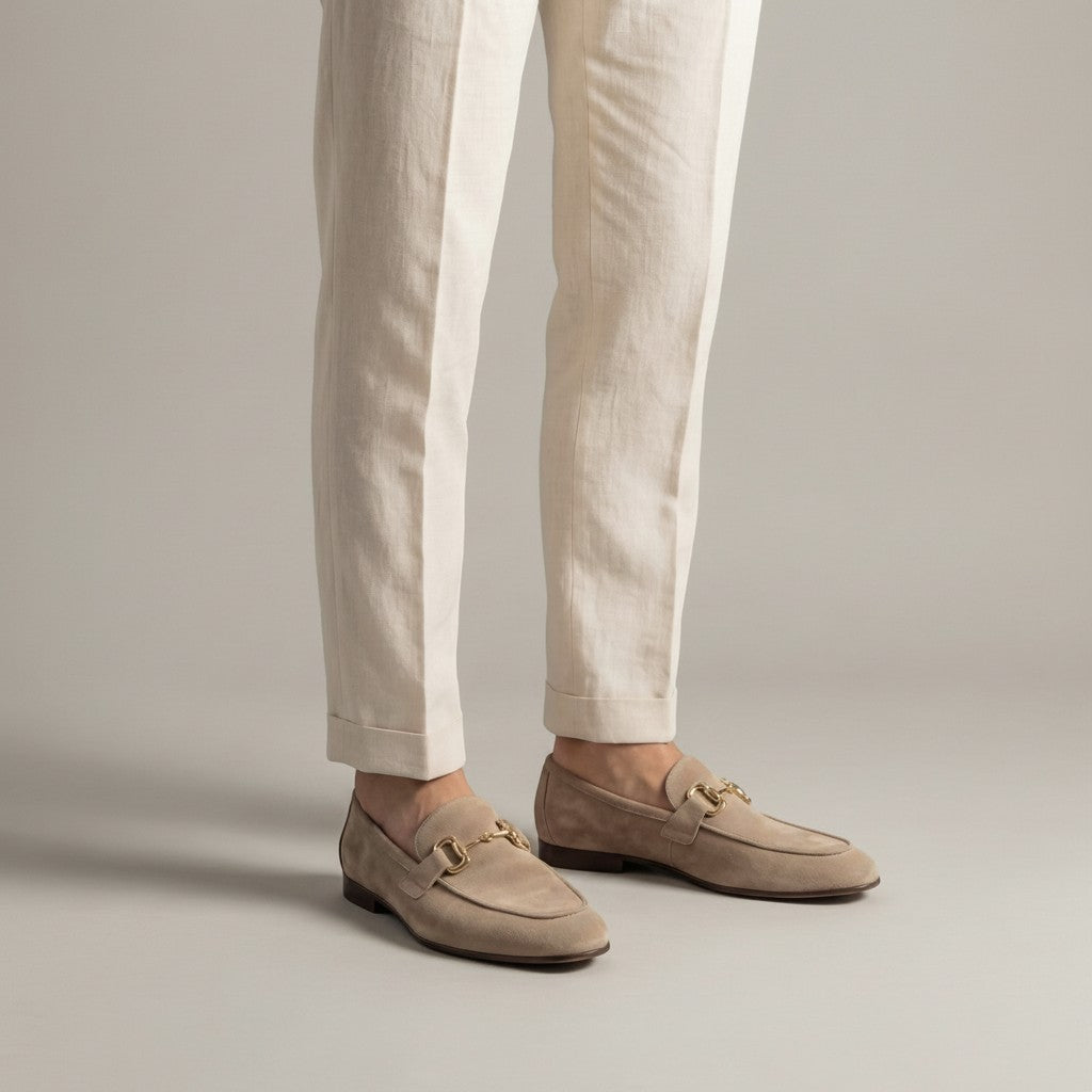 Silvorne men's taupe suede loafers with gold horsebit detail and almond toe.