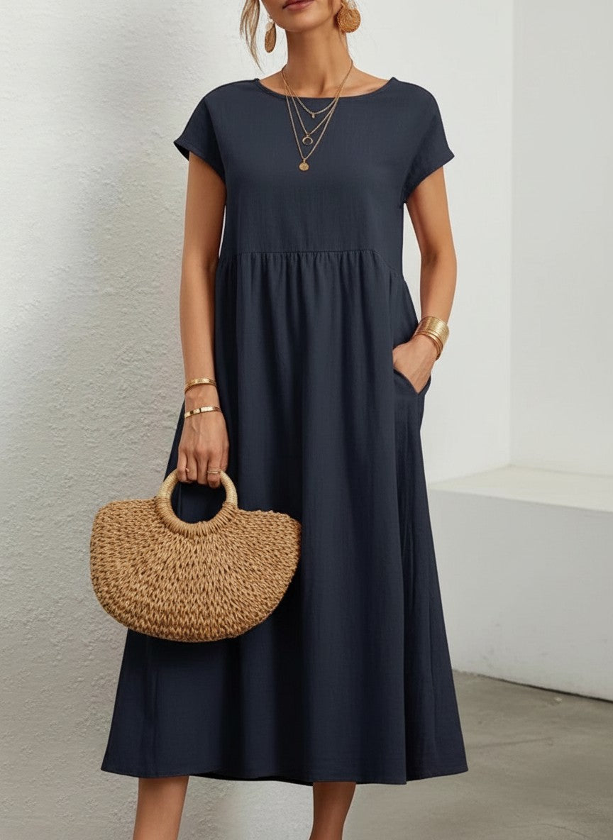 Silvorne Vestido maxi de lino y algodón azul marino de manga corta con bolsillos y cuello redondo.