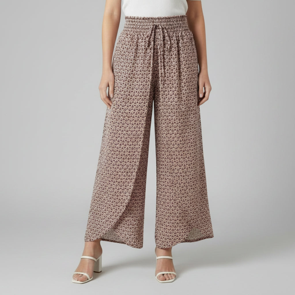 Silvorne women's wide-leg trousers with elastic waistband and a geometric print in brown and pink.