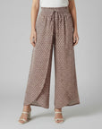 Silvorne women's wide-leg trousers with elastic waistband and a geometric print in brown and pink.