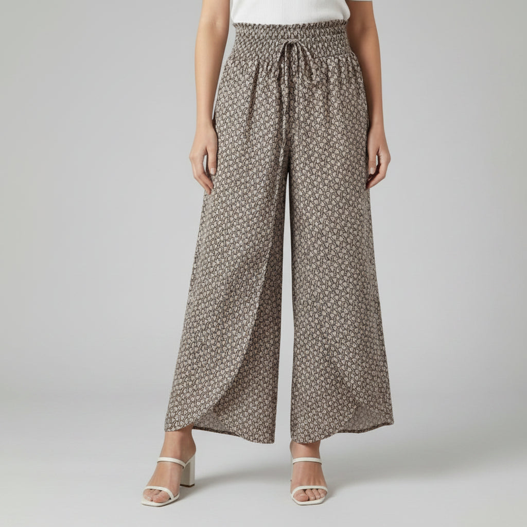 Silvorne women's wide-leg trousers in beige with a dark grey geometric pattern, elasticated waistband, and drawstring.
